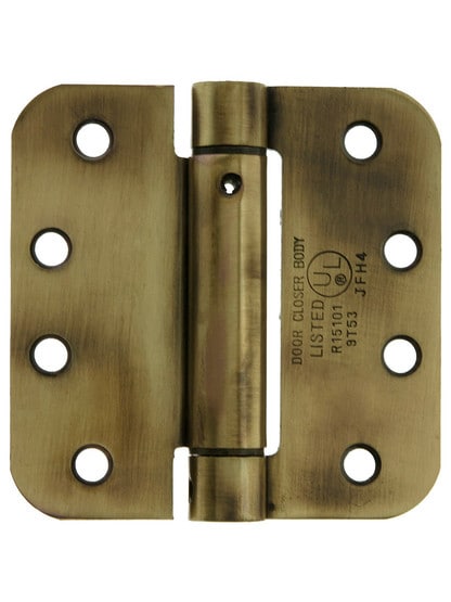 4 inch Spring Hinge With 5/8 inch Radius Corners Antique Brass.